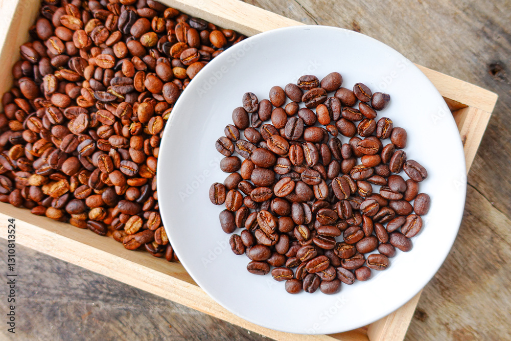 Fototapeta premium Close-Up of Roasted Coffee Beans in Wooden Box