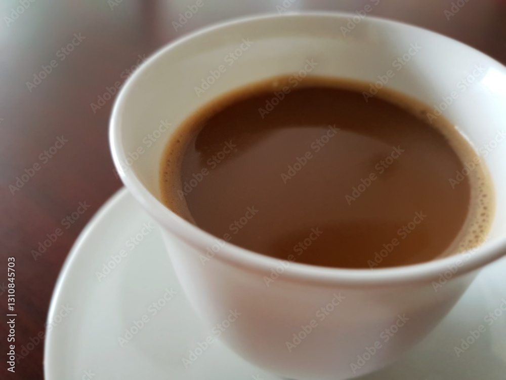 Coffee in cup on table with tea at coffee shop Coffee in cup on table with tea at coffee shop