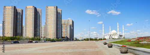 Independence Square in Astana, Kazakhstan. Hazret Sultan Mosque on a sunny summer day. . photo