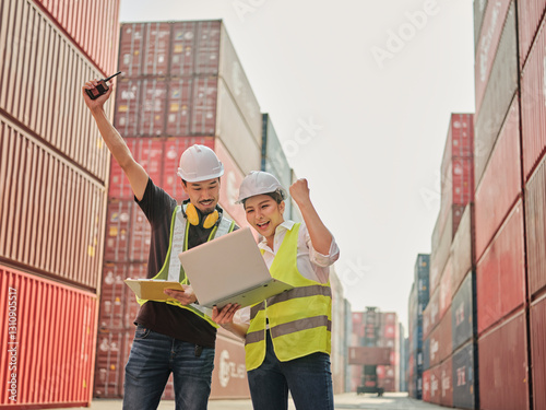 Asian happy worker and engineer co-working with laptop