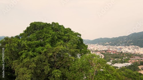 Aerial view beautiful Patong Beach in Phuket Thailand, Landscape of patong city phuket in sunny summer day time, Beautiful tropical sea,High angle view Sea beach Sunset in the evening