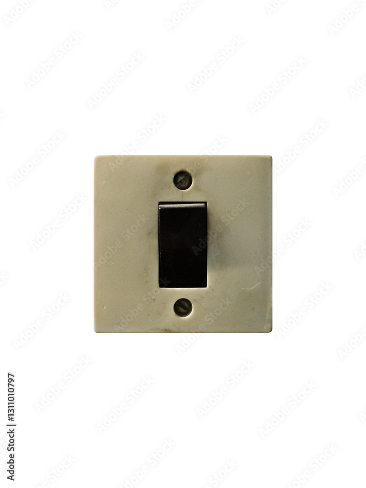 Old plastic surface-mounted wall switch is isolated. The switch body is beige and the button is black. Old plastic surface-mounted wall switch is isolated. The switch body is beige and the button is black.