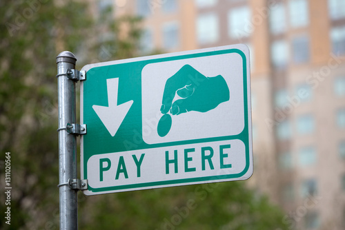 Pay Here for parking street sign.