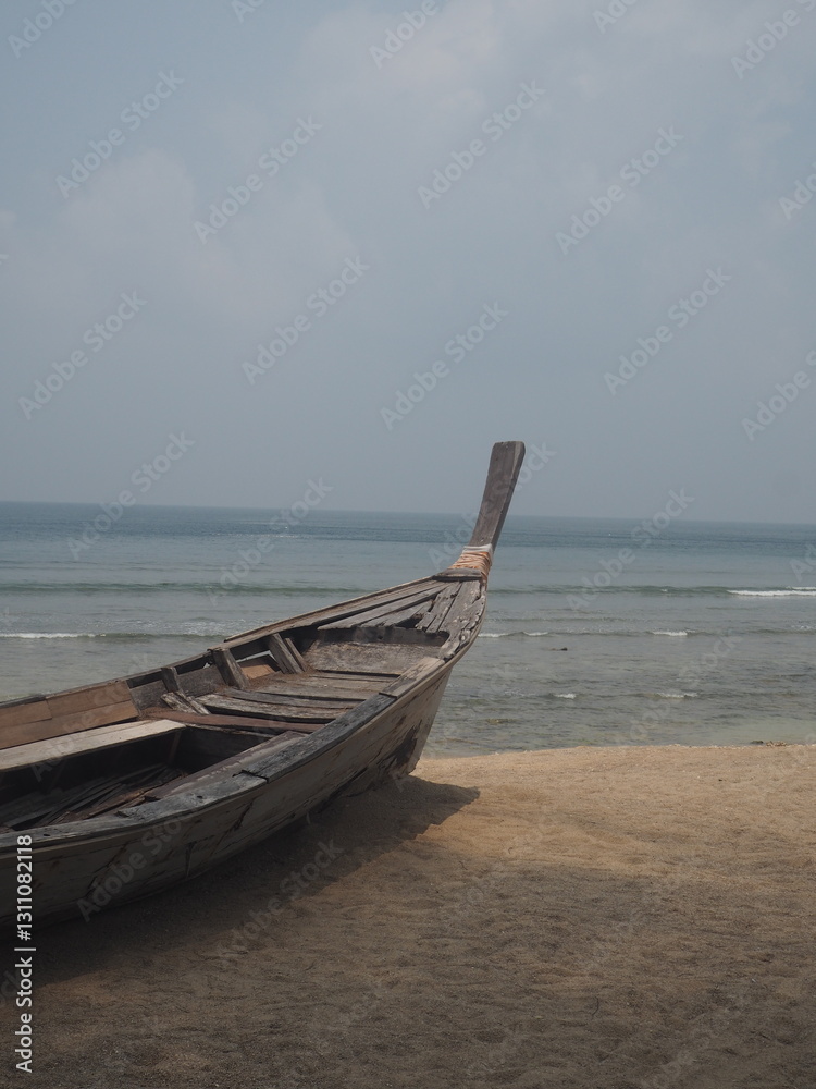 Thailand wooden boat beach overcast sand ocean Thailand wooden boat beach overcast sand ocean