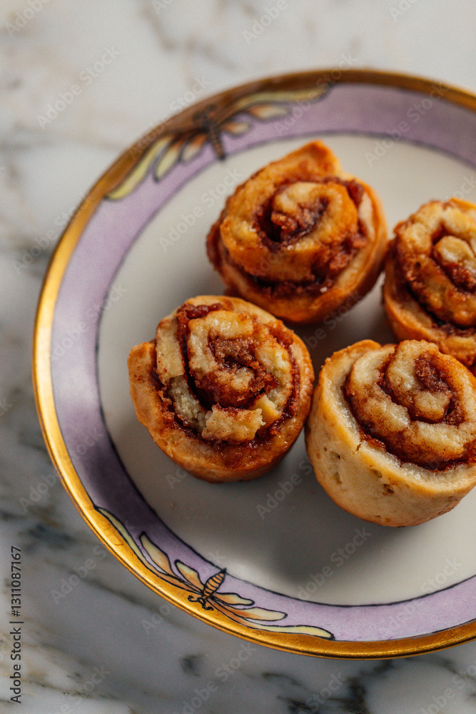 mini cinnamon rolls on fancy plate mini cinnamon rolls on fancy plate