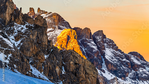 Canvas-taulu the illuminated peaks of snow-capped mountains in Italy