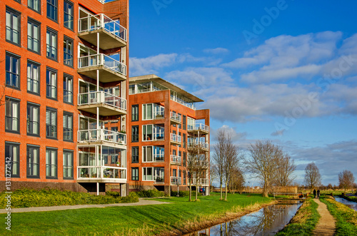 Pijnacker, The Netherlands, January 12, 2025: apartment buildings at the edge of a green natural area