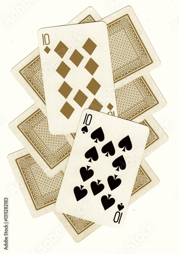 Photography A montage of playing card backs with a pair of tens revealed in sepia