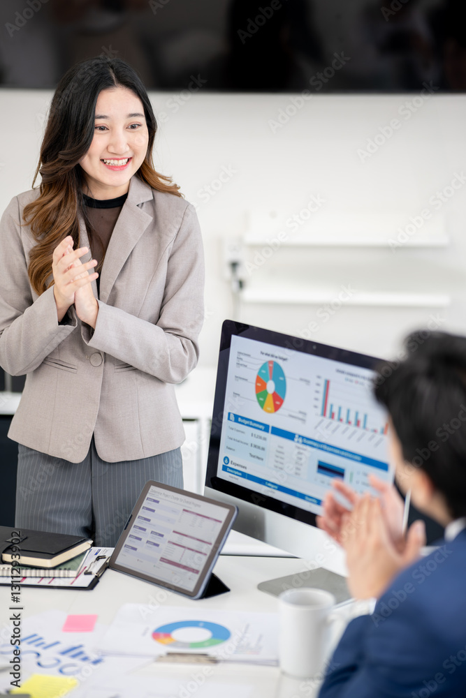The sales team is having a marketing planning meeting in the conference room. The sales team is having a marketing planning meeting in the conference room.