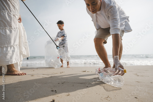 Asian family conservation recycle beach together. Father Protect environmental. photo