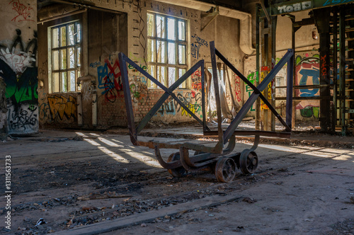 Obraz na płótnie old abandoned factory with a mining lorry in the foreground w salonie