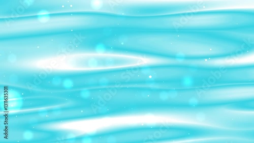 Bokeh creates ethereal blue and white abstract background. Suitable for web design, social media graphics, or artistic projects.