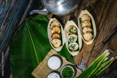 Khanom Krok is an ancient Thai dessert made from flour, sugar and coconut milk