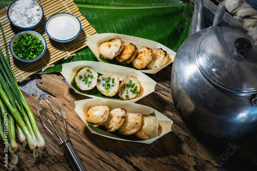 Khanom Krok is an ancient Thai dessert made from flour, sugar and coconut milk