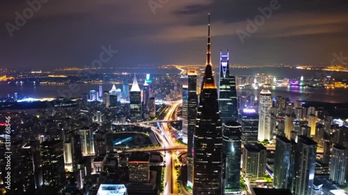 Wallpaper Mural Shot from a drone moving high above a magnificent endless night city with skyscrapers, very tall mirrored buildings, shining lights, with cars moving along the roads. Torontodigital.ca