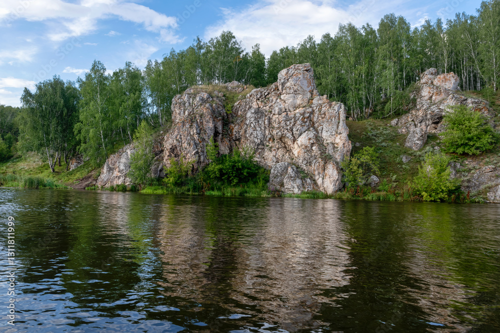 The orangutan-like rock is a mountain peak located on the banks of the Iset River in the city of Kamensk-Uralsky The orangutan-like rock is a mountain peak located on the banks of the Iset River in the city of Kamensk-Uralsky