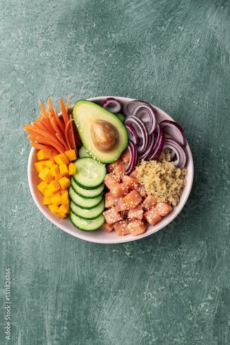 poke bowl salmon with quinoa and vegetables, healthy nutrition, top view