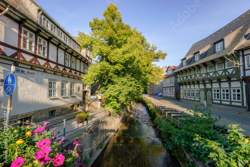 Goslar, Germany – August 27, 2024: Sun is setting at the Abige or Abzucht canal of Goslar. It is water coming from the Bocksberg mountain and flows from the Gose river into the Abige canal in Goslar.