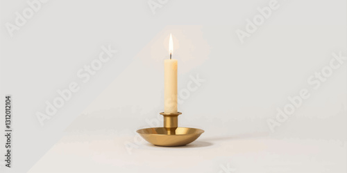 Burning beeswax candle in brass holder