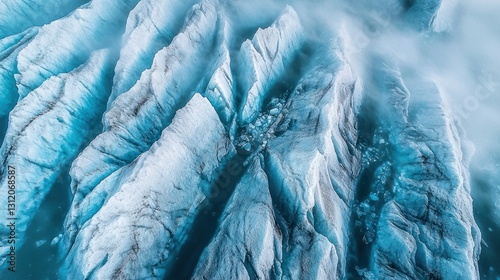 Wallpaper Mural Aerial view of glacial ice formations, deep blue crevasses, and misty atmosphere. Torontodigital.ca