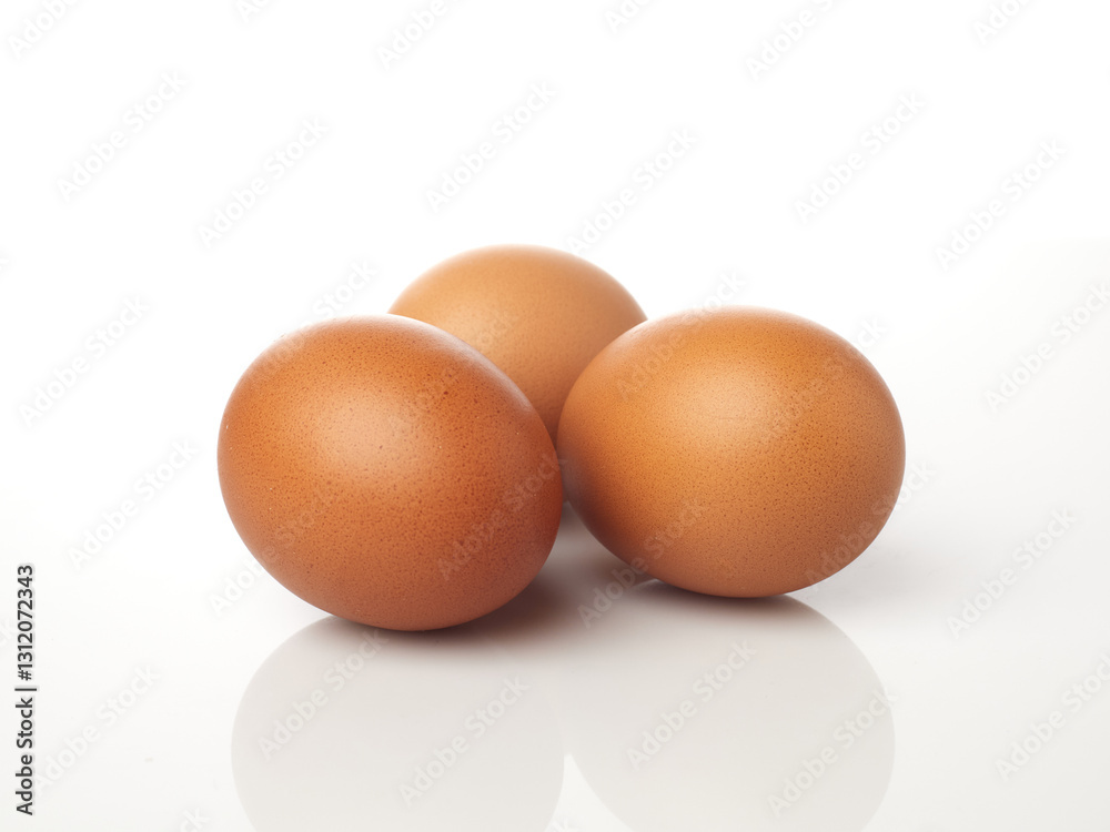 Brown Eggs Isolated in White Background Showcasing Their Smooth Texture and Natural Color Scheme Brown Eggs Isolated in White Background Showcasing Their Smooth Texture and Natural Color Scheme