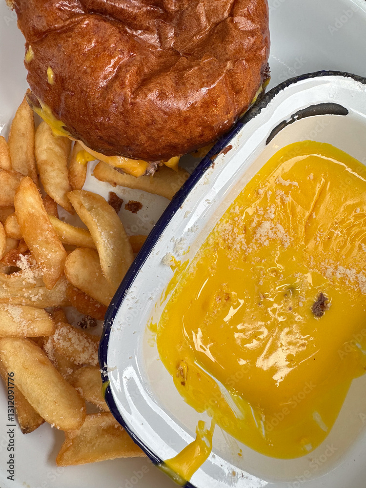 Cheeseburger and Fries with Cheese Sauce