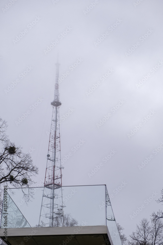 Foggy Communication Tower with Glass Railing