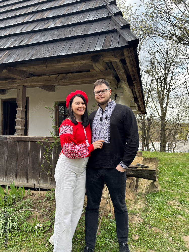 Couple in Traditional Embroidered Clothing Outdoors