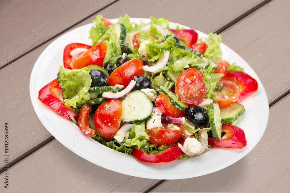 Fresh garden tasty salad with greens and vegetables Fresh garden tasty salad with greens and vegetables