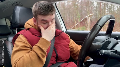 male driver buckled up in car and feels bad. depressed, lost