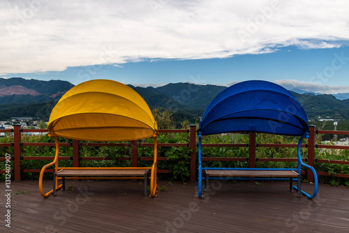 colorful benches and wooden floor at the observatory