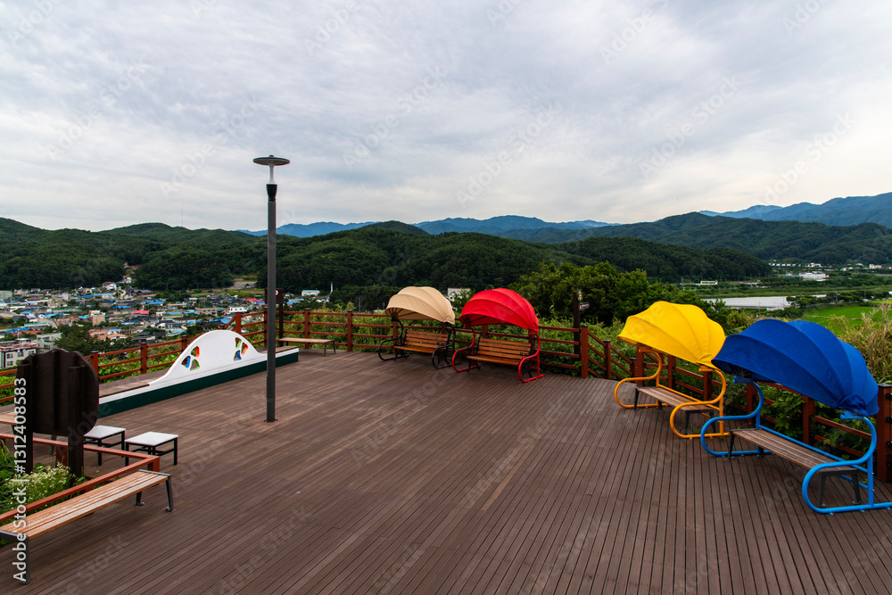colorful benches and wooden floor at the observatory