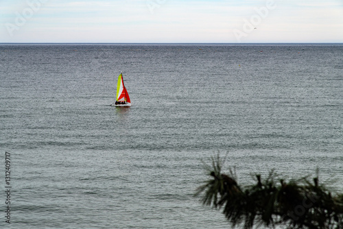 Obraz na płótnie idyllic seascape with a sail boat on the sea w salonie