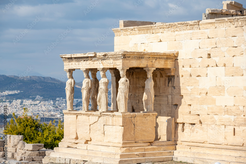 Obraz premium Ancient Erechtheion Greek temple with Porch of the Caryatids on the north side of the Acropolis in Athens, Greece. It was dedicated to both Athena and Poseidon. Caryatids at Porch of the Erechtheion,.