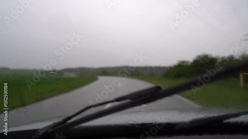 View from car window while driving in the rain