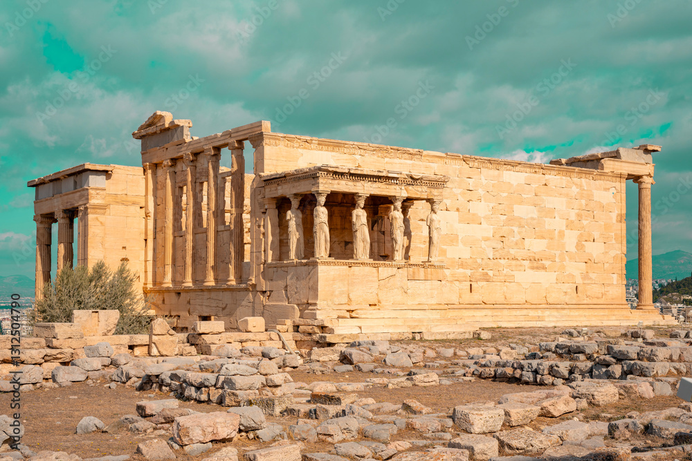 Fototapeta premium Ancient Erechtheion Greek temple with Porch of the Caryatids on the north side of the Acropolis in Athens, Greece. It was dedicated to both Athena and Poseidon. Caryatids at Porch of the Erechtheion.