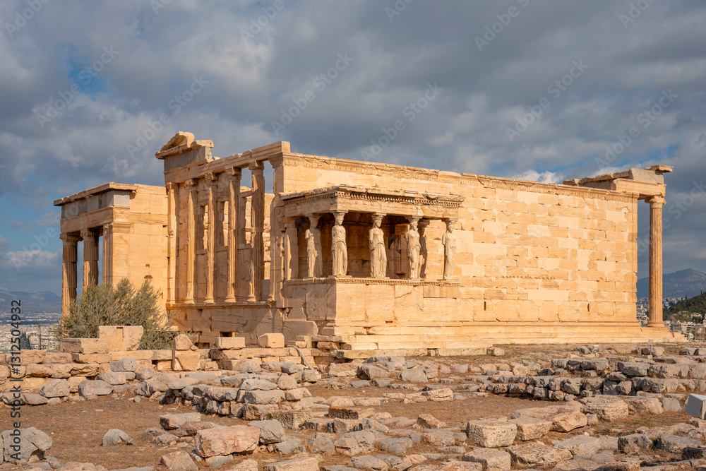 Obraz premium Ancient Erechtheion Greek temple with Porch of the Caryatids on the north side of the Acropolis in Athens, Greece. It was dedicated to both Athena and Poseidon. Caryatids at Porch of the Erechtheion.