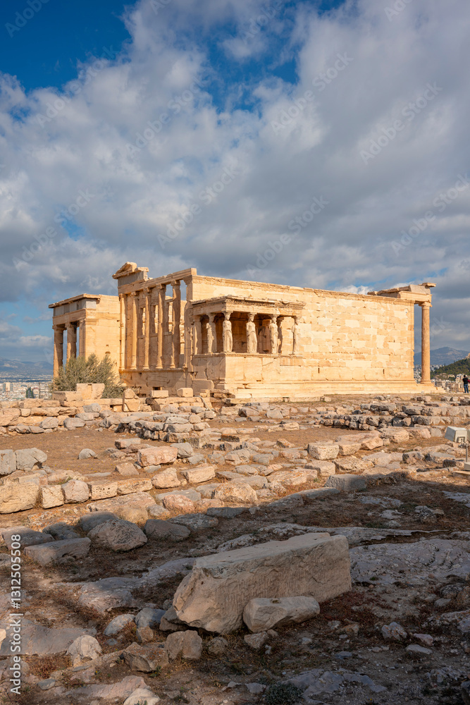 Obraz premium Ancient Erechtheion Greek temple with Porch of the Caryatids on the north side of the Acropolis in Athens, Greece. It was dedicated to both Athena and Poseidon. Caryatids at Porch of the Erechtheion.