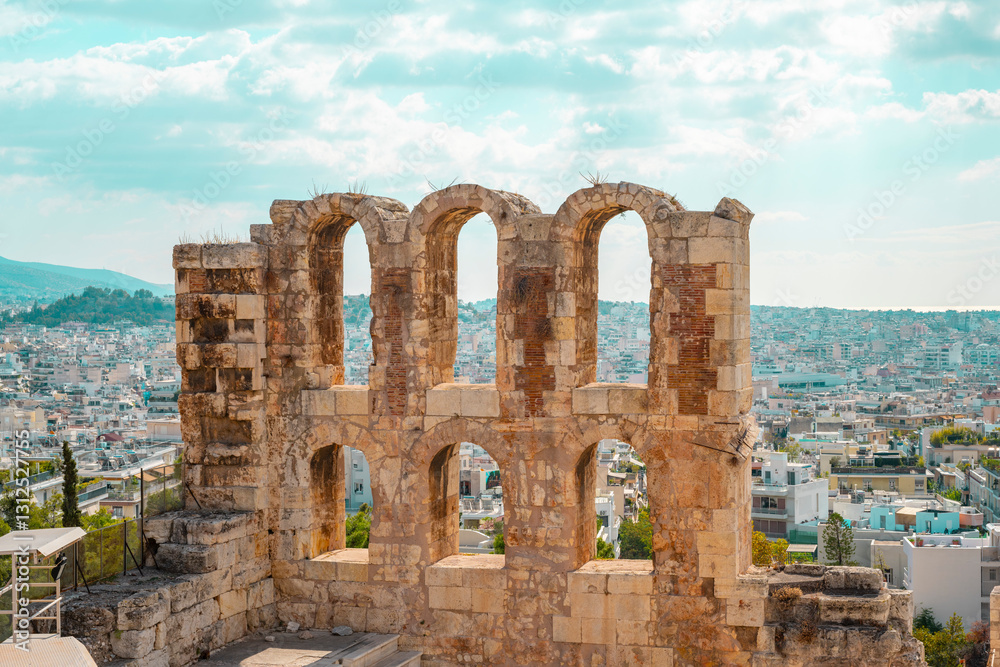 The Roman theater of Odeon of Herodes Atticus in the foreground and the Filopappou Hill in the background The Roman theater of Odeon of Herodes Atticus in the foreground and the Filopappou Hill in the background