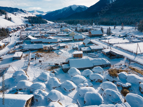 Village in the Altai Mountains, a snowy village in eastern Kazakhstan