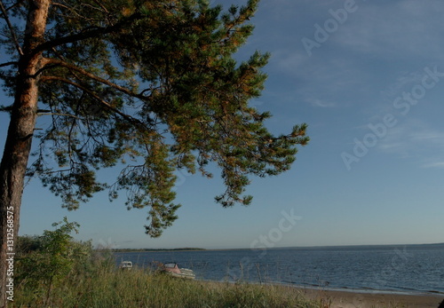 fishing boats on the sandy shore of the White Sea