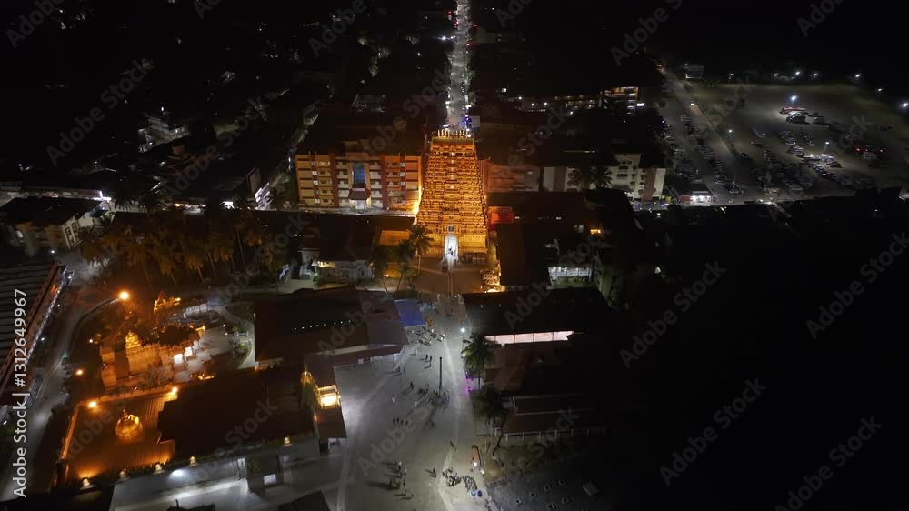 Night aerial view of Sringeri Sharada Temple, located in the Chikkamagaluru district of Karnataka, India, alongside the serene Tunga River.