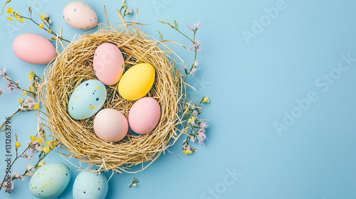Pastel Easter Eggs in Nest on Blue Background
