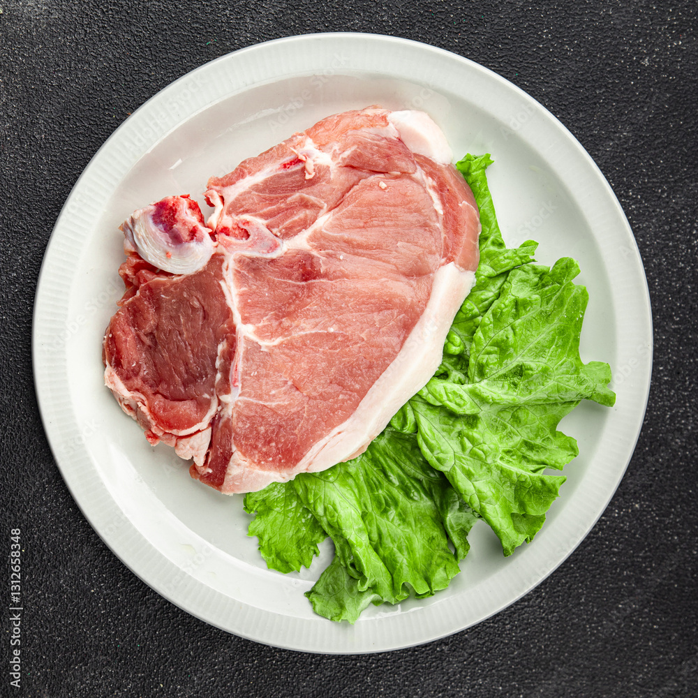 Pork on bones raw meat fresh tasty food dish delicious gourmet food background on the table rustic food top view copy space Pork on bones raw meat fresh tasty food dish delicious gourmet food background on the table rustic food top view copy space