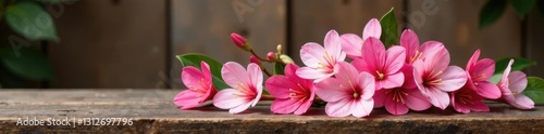Pink Alstroemeria flowers on a wooden table or bench, decorative, wood, horticulture