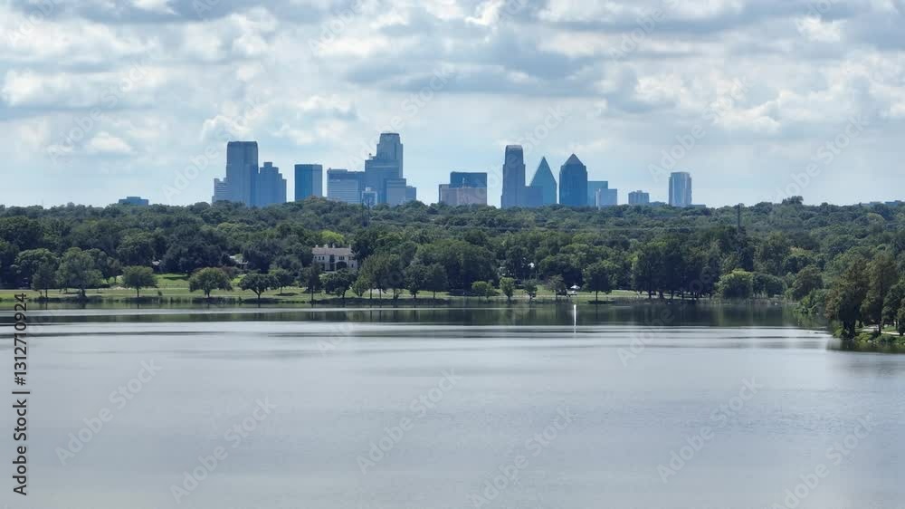 Dallas Texas Skyline Over White Rock Lake on a Partly Cloudy Day Dallas Texas Skyline Over White Rock Lake on a Partly Cloudy Day