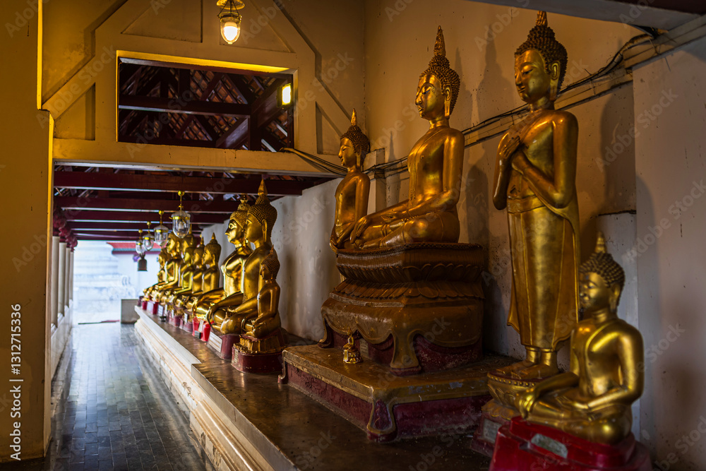 Old Beautiful Golden Buddha Many statues at Wat Phra Si Rattana Mahathat also colloquially referred to as Wat Yai is a Buddhist temple It is a major tourist is Public places in Phitsanulok,Thailand.