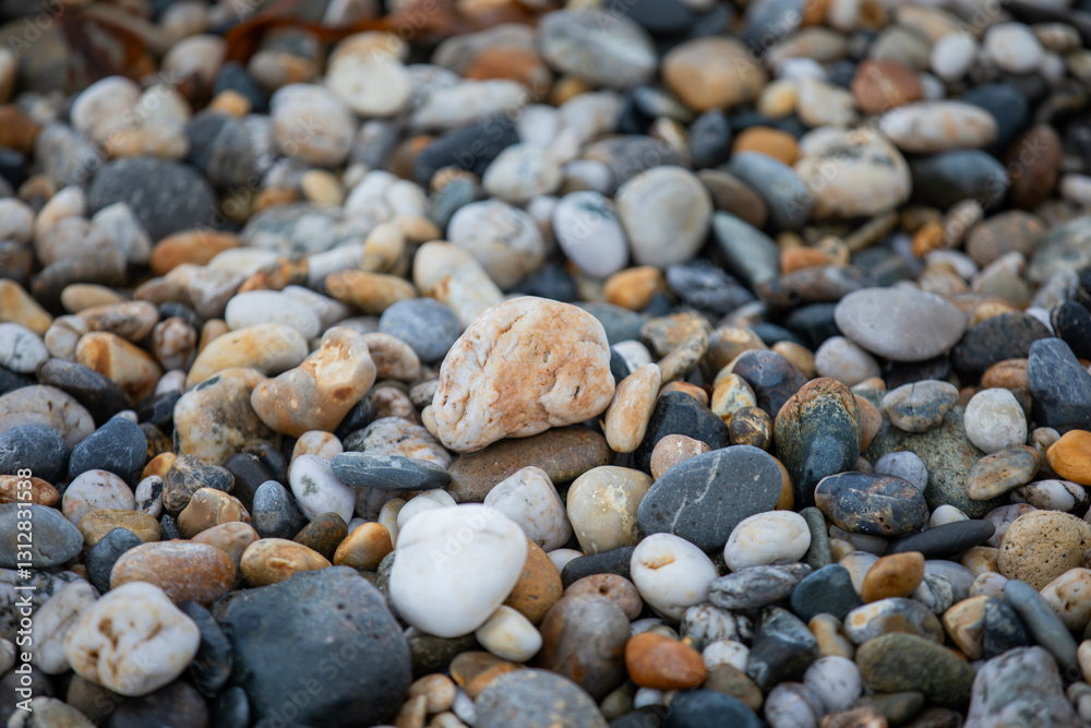 Rocks and pebbles along Marazion Beach in Cornwall, UK. Rocks and pebbles along Marazion Beach in Cornwall, UK.