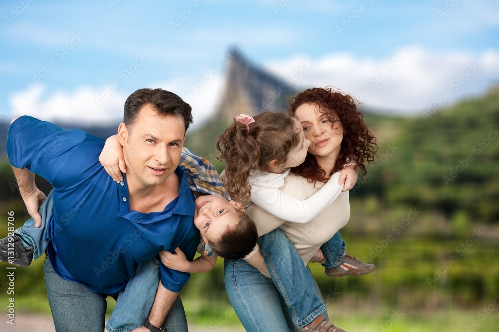 Fototapeta premium Happy young family with children at nature park background