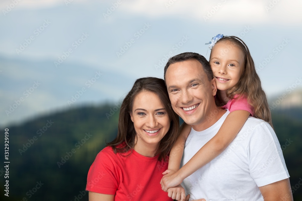 Happy young family with children at nature park background Happy young family with children at nature park background